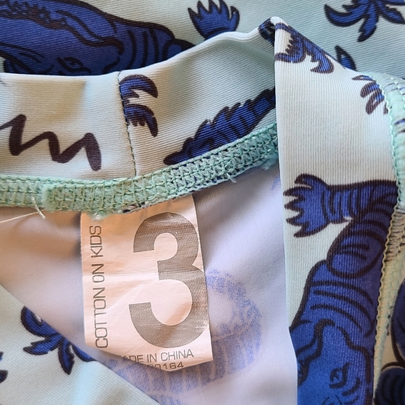 Blue rashguard swimsuit top with alligator print - Picture 2 of 2